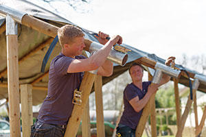 Staff putting up a trouble-free tent